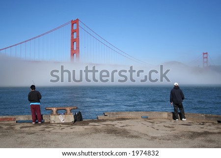 two men fishing near golden gate bridge