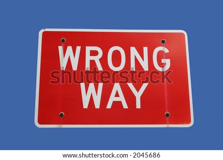 red wrong way road sign