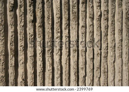 concrete background with parallel raised ridges