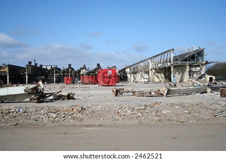partially demolished derelict factory in industrial area