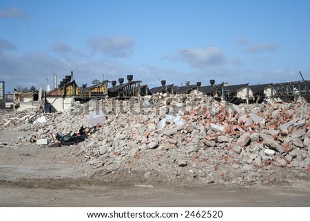 partially demolished derelict factory in industrial area