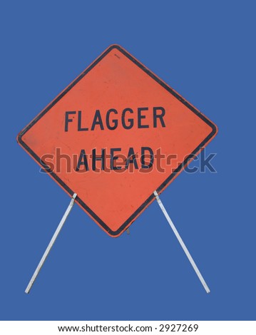 Flagger ahead construction sign isolated on blue