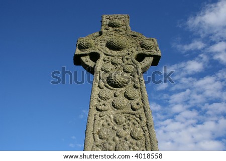 Looking up Celtic cross near Iona Abbey Scotland