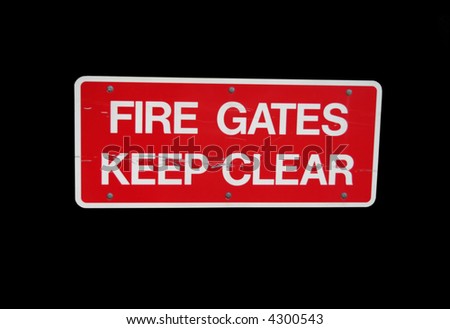 fire gates keep clear sign on black