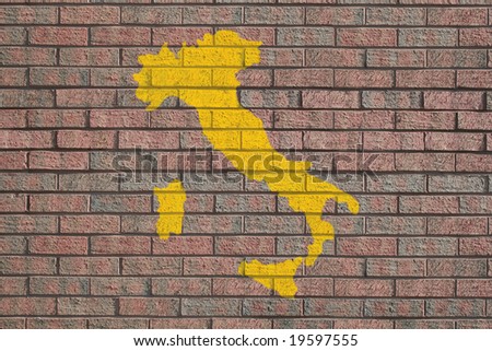 yellow Italy map painted on brick wall