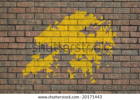 yellow Hong Kong map painted on brick wall