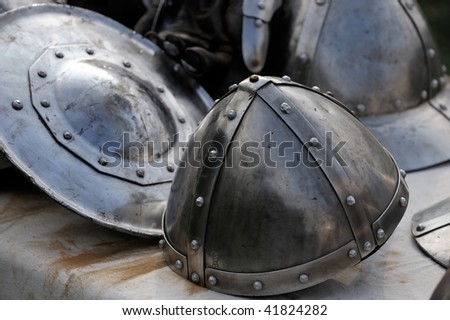 A knight Helmet and Shield in a medieval festival