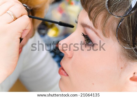 Close-up eye and mascara during make-up session