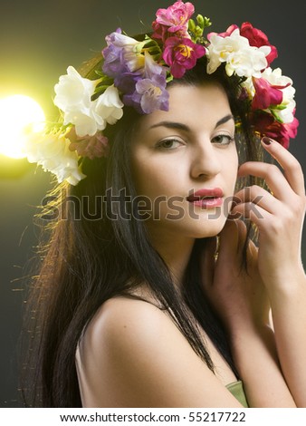 stock photo studio portrait of a beautiful with flower crown