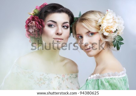stock photo two beautiful sensual women with flowers in hair