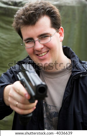 Man with a gun aim at you