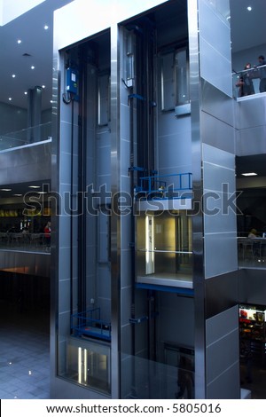 Two lifts in hall of city centre hall