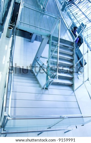 metal stairs and panaramic view of hall