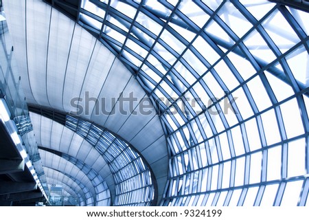 grey unusual geometric ceiling of office building