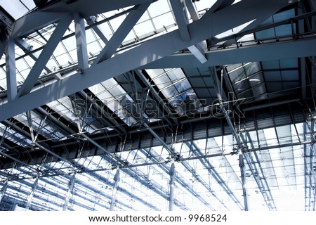 grey unusual geometric ceiling of office building