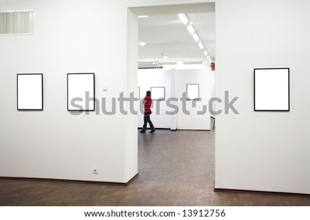 wall in museum with empty frames