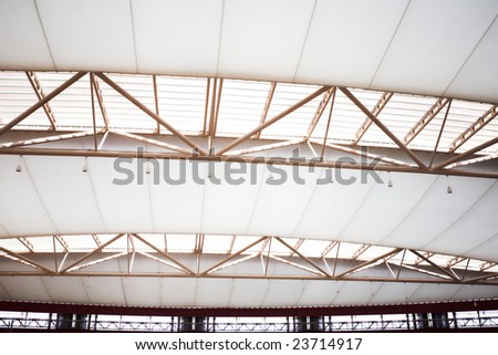white unusual geometric ceiling of office building