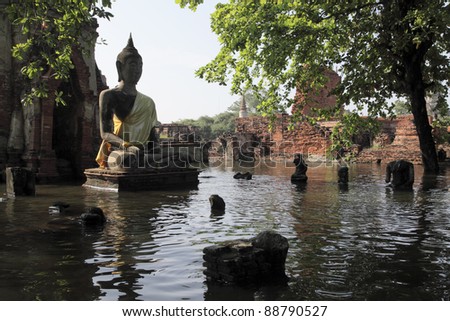 AYUTTHAYA, THAILAND-OCTOBER 23: Wat Mahathat is void of visitors during the flood on October 23, 2011 in Ayutthaya Thailand.