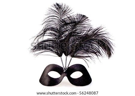 Black Masquerade Mask On A White Background. Studio Shot Stock Photo