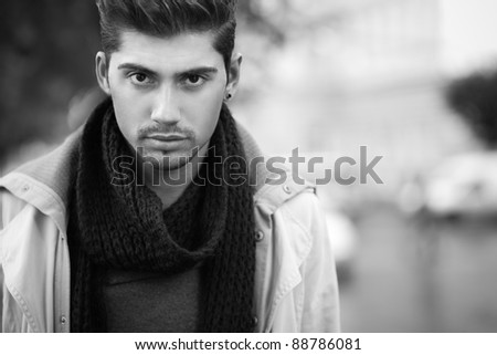 confident young man on street.
