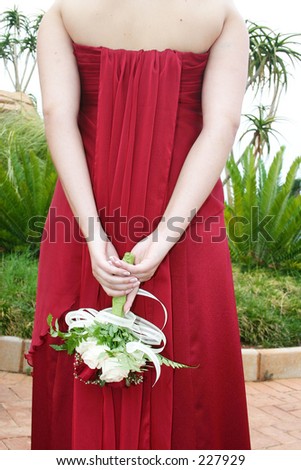 white rose bouquet bridesmaid. stock photo : Bridesmaid in a