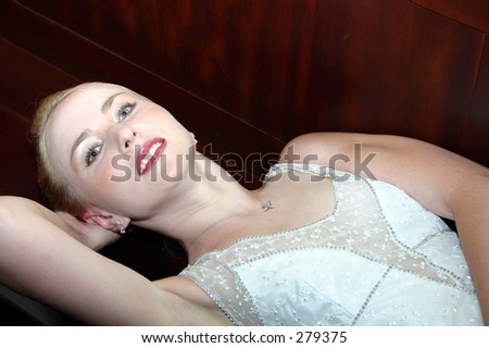 woman resting with arm behind her head