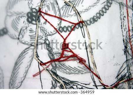 pen drawing on trasparent paper with red string