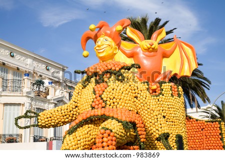 stock photo festival charcters on a float in Menton France
