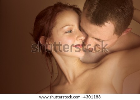 Young couple, man and woman, in loving embrace