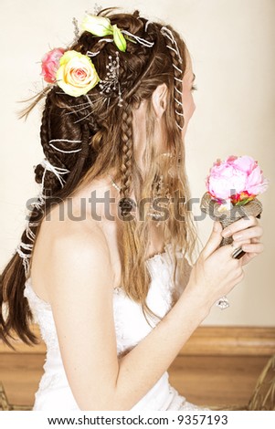 stock photo Beautiful young bride with long brown hair in wedding dress