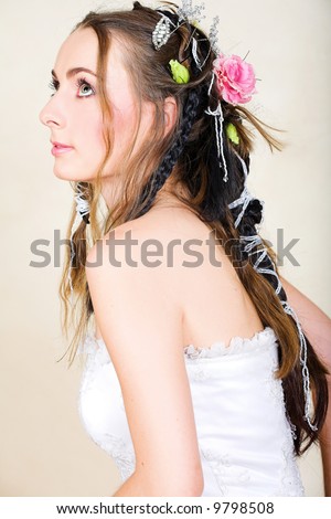 stock photo Beautiful young bride with long brown hair in wedding dress 