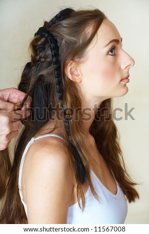 long brown hair extensions. stock photo : young woman with long brown hair and green eyes getting her 