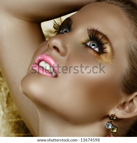stock photo Digital manipulation of a beautiful woman with fantasy golden