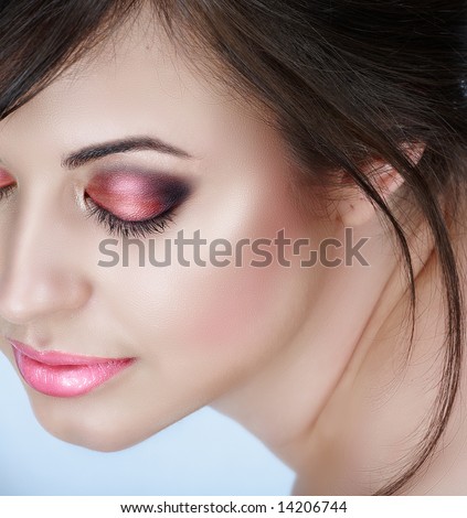 smokey eyes close up. woman with pink smoky eyes