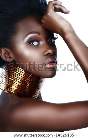 Organic Makeup on Beautiful South African Woman With Bronze Necklace And Natural Make Up