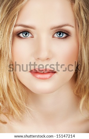 stock photo Blond beautiful woman face closeup with natural makeup 