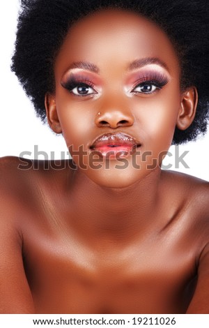 beautiful African woman with long false eyelashes and natural makeup