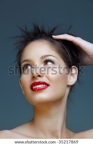 stock photo Beautiful laughing brunette woman with red lips and long 