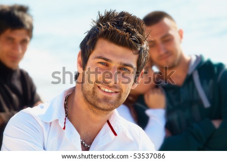 stock photo : Turkish young man with mullet hairstyle in white shirt with 
