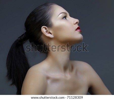 The Injection Stock-photo-beautiful-woman-with-long-black-hair-in-ponytail-and-shiny-skin-looking-up-in-profile-natural-make-71128309