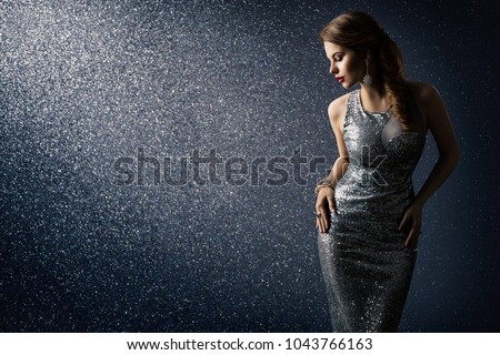 Silver Dress, Fashion Model Posing in Sparkling Sexy Gown, Elegant Woman Beauty Portrait on Lighting Sparkles Background