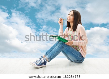 Girl teenager thinking inspiration or write idea, Artist Creativity Concept, Young Woman sitting over blue sky background