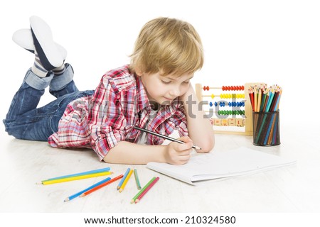 School boy writing exercise in notebook. Schoolboy do a sum of mathematics homework, isolated on white background