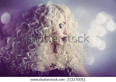 Woman Fashion Beauty Portrait, Model Girl Hairstyle with Blond Curly Hair, Beautiful Makeup, Long Curls and Tattoo
