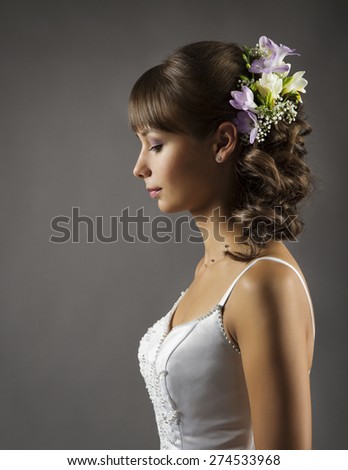 Bride Portrait, Wedding Hairstyle with Flowers, Bridal Hair Style over gray background