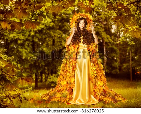 Autumn Fairy Woman in Forest, Nymph in Yellow Leaves Dress, Fantasy Goddess of Earth