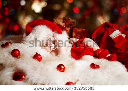 Christmas Newborn Baby, New Born Kid Sleeping in Red Santa Hat, one month old