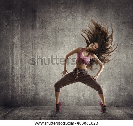Fitness Sport Dance, Woman Dancer Flying Hair Dancing over Concrete background