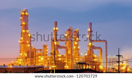 Architecture of Oil Refinery Plant with distillation tower with Sunrise Twilight