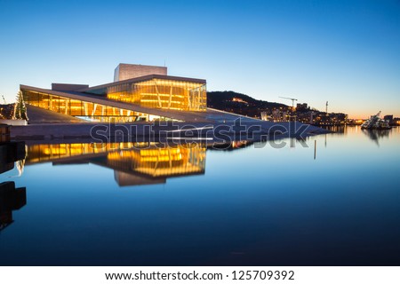 Oslo, Norway - January 1: National Oslo Opera House Shines At Sunrise On January 1, 2013. Oslo Opera House Was Opened On April 12, 2008 In Oslo, Norway
